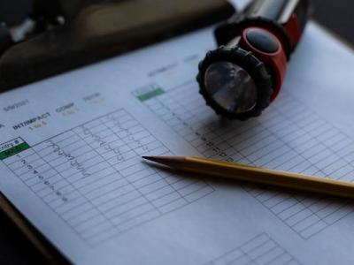 Judging sheet with pencil and flashlight.