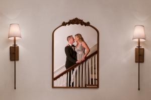 Couple in a mirror by La Crosse Photographer Jeff Wiswell of jlwiswell.com