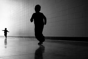 Kids running in shadow