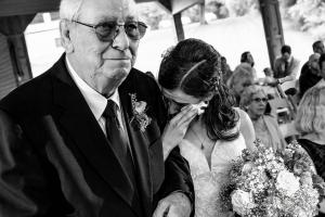 A dramatic moment between a bride and her grandfather right before her wedding ceremony at Winnebago Springs Venue in Caledonia, MN by La Crosse Photographer Jeff Wiswell of J.L. Wiswell Photography