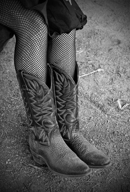 Maker: Kristi Olson Entered in: 2011 October Competition - A Prints Score: 40 points  1st PlaceJudge's comments: great detail; sharpness falls off a little; eyes drawn to bootsMaker's comments: 