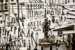 Wall filled with old tools.