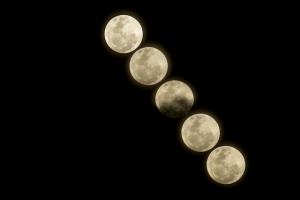 Composite of a series of moon photos.